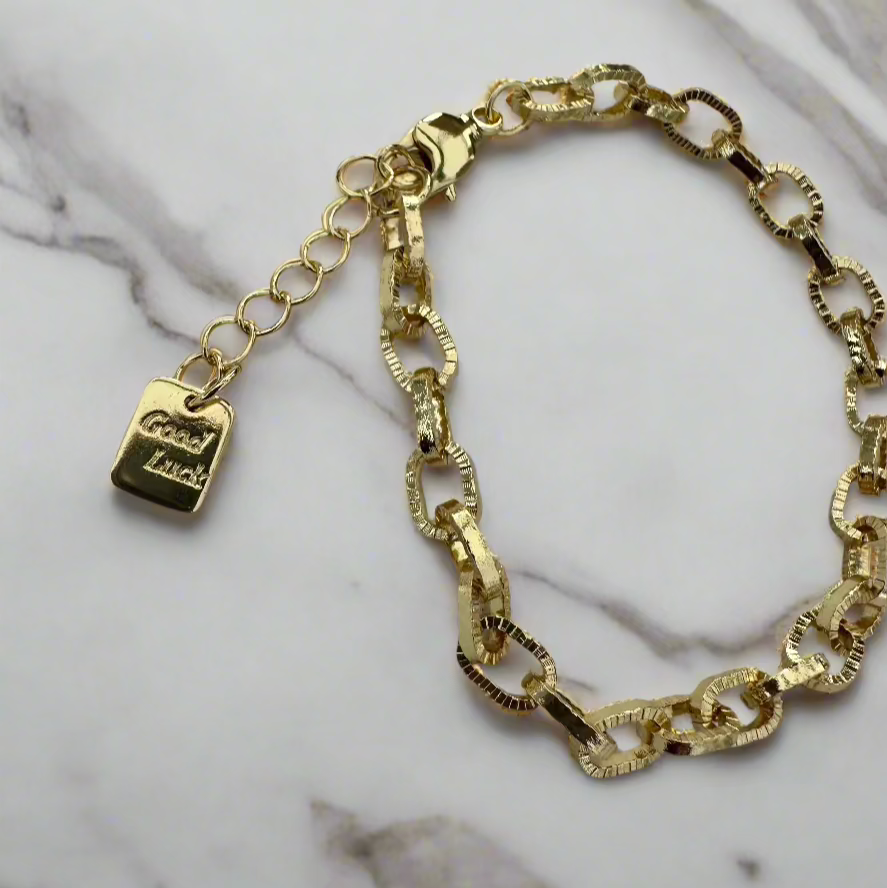 good luck bracelet on marble countertop