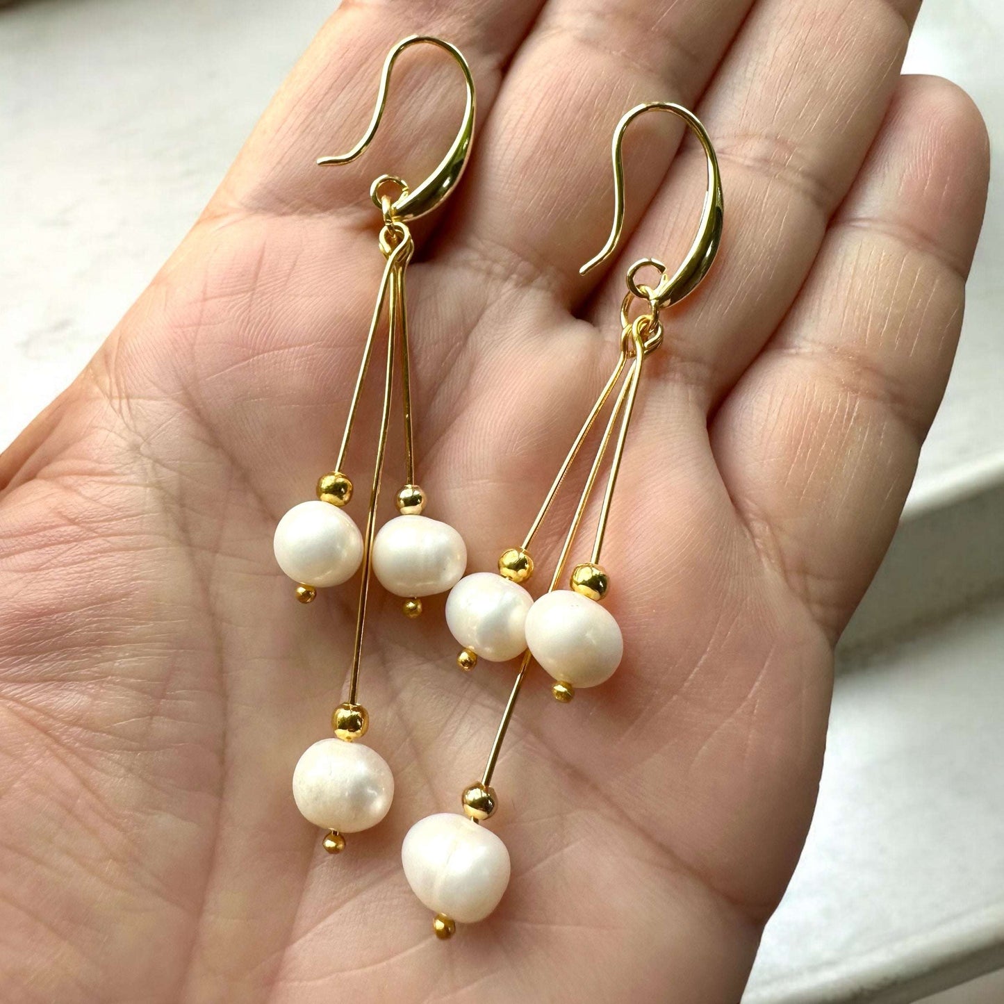 Pure Elegance Earrings - Gold Filled with pearls in hand